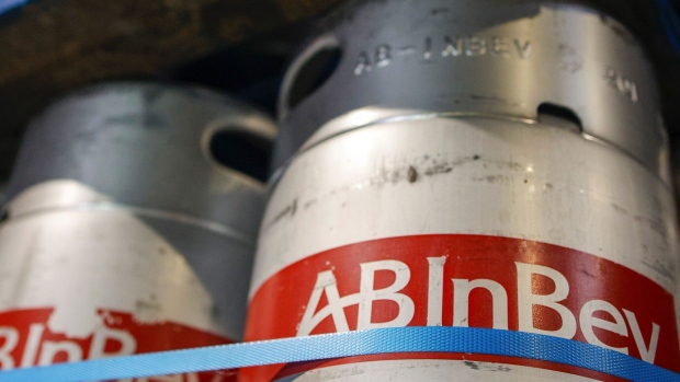 The Anheuser-Busch InBev NV logo on beer barrels at the AB Inbev beverage distribution depot in Leuven, Belgium, on Tuesday, May 4, 2021. AB Inbev reports first quarter earnings on May 6. Photographer: Olivier Matthys/Bloomberg