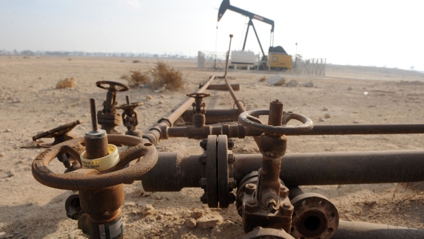 An oil pump in the Awali oil field in Bahrain. Photographer: Phil Weymouth/Bloomberg