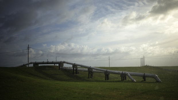 <p>A pipeline across a levee in Golden Meadow, Louisiana</p>