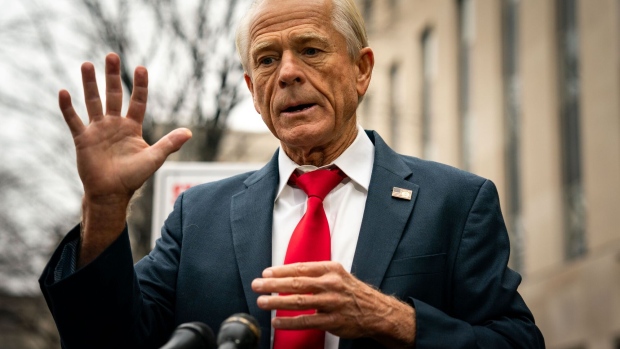 <p>Peter Navarro speaks to members of the media while arriving for his sentencing at federal court in Washington, DC, on Jan. 25. </p>