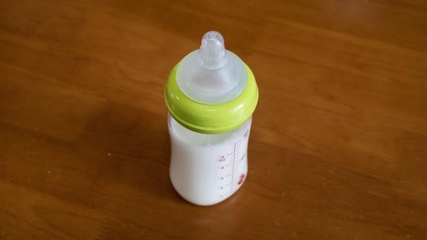 A bottle of milk prepared from infant formula on a table. Photographer: Giulia Marchi/Bloomberg