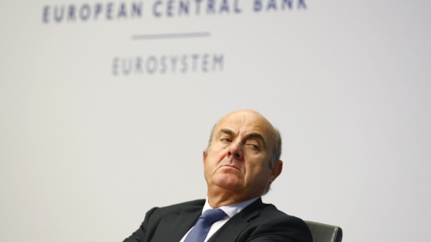 Luis de Guindos, vice president of the European Central Bank (ECB), listens during a rates decision news conference in Frankfurt, Germany, on Thursday, Sept. 12, 2019. The ECB cut interest rates further below zero and will start open-ended bond purchases after President Mario Draghi overcame critics of his stimulus policies to make a final run at reflating the euro-area economy. Photographer: Alex Kraus/Bloomberg