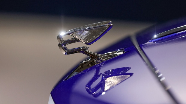 <p>A winged B hood ornament on a Bentley Flying Spur limousine at Volkswagen’s annual meeting last year in Berlin.</p>