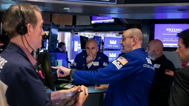 <p>Traders on the floor of the New York Stock Exchange.</p>