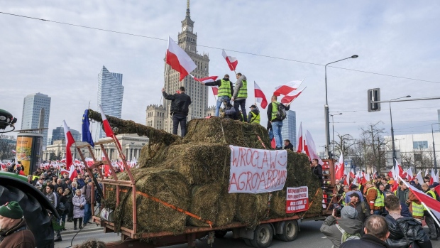 A mock up of a tank during a protest by Polish farmers against imports of Ukrainian grain in downtown Warsaw on Feb. 27.  Photographer: Damian Lemański/Bloomberg