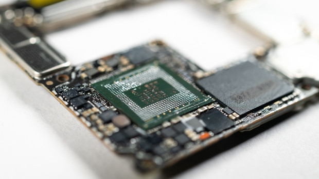 A chip from a Huawei Technologies Co. Mate X5 smartphone. Photographer: James Park/Bloomberg