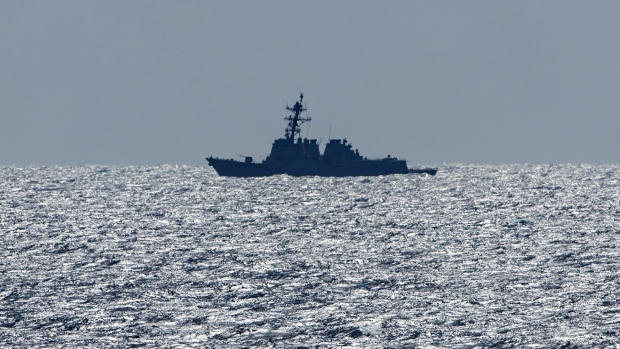 The USS Mason destroyer ship patrols near the USS Dwight D. Eisenhower (CVN 69) aircraft carrier during operations in the southern Red Sea, on Wednesday, March 20, 2024. Houthi militants started attacking Red Sea shipping in November 2023, ostensibly as a means of pressuring Israel to end its war in Gaza against Hamas, with the US and UK responding with airstrikes including the use of jets from the USS Eisenhower against the Houthis' military assets. Photographer: Christopher Pike/Bloomberg