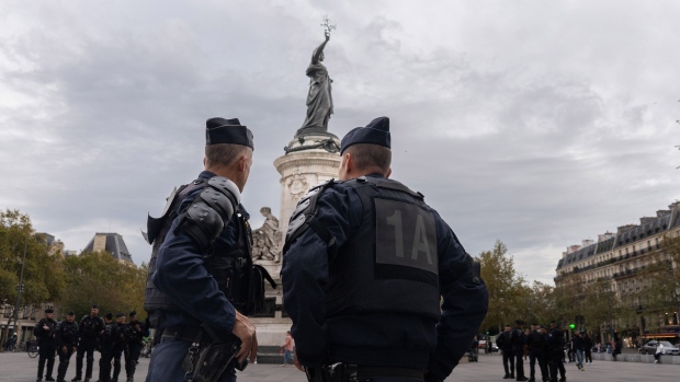 <p>French police officers patrol on Place de la Republique in central Paris, France.</p>