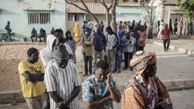 <p>People line up to vote during the presidential election in Dakar, March 24. </p>