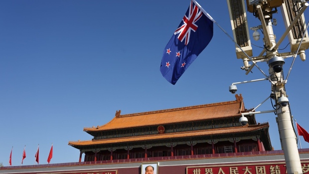 <p>The New Zealand flag waves in Tiananmen Square in Beijing. </p>