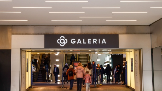 Shoppers enter a Galeria Karstadt Kaufhof GmbH department store in Munich, Germany, on Thursday, Feb. 15, 2024. 
