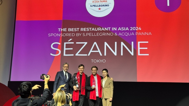 The Sezanne team accepting the award for the best restaurant in Asia. Photographer: Emily Yamamoto/Bloomberg