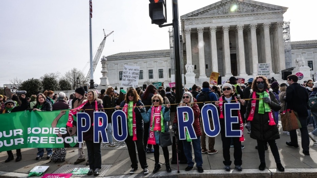 Demonstrators protest outside the US Supreme Court in Washington, DC, US, on Tuesday, March 26, 2024. The court on Tuesday will hear oral arguments on whether to limit the use of mifepristone, one of two drugs most commonly used for abortions in the US.