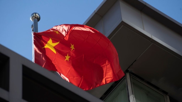 A Chinese national flag waves at the Chinese consulate after the United States ordered China to close its doors on July 22, 2020 in Houston, Texas. Photographer: Go Nakamura/Getty Images North America