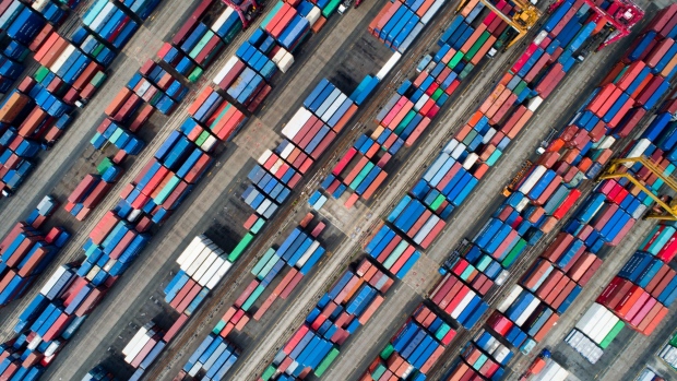 Shipping containers sit stacked in this aerial photograph taken above a port in South Korea. Photographer: Bloomberg Creative Photos/Bloomberg