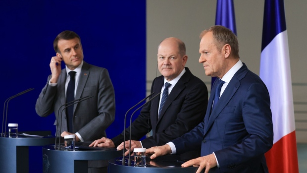 Macron, left, Scholz and Donald Tusk, Poland’s prime minister during a joint press statement at the Chancellery in Berlin on March 15. Macron is ramping up pressure on Scholz to take a stronger stance in support of Ukraine.