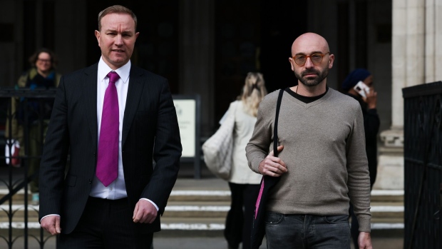 Carlo Palombo, former trader at Barclays Plc, right, and Tom Hayes, a former trader at UBS Group AG and Citigroup Inc., outside the Royal Courts of Justice in London, UK, on Friday, March 15, 2024. Hayes and Palombo's appeal was referred to the Court of Appeal by the Criminal Cases Review Commission, the body that investigates potential miscarriages of justice, after a US court decision that overturned the convictions of two Deutsche Bank AG traders over interest rate fixing. Photographer: Hollie Adams/Bloomberg