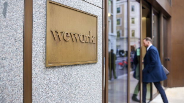 An entrance to a WeWork office space in the City of London, UK, on Tuesday, March 26, 2024. Adam Neumann and several partners submitted an offer to buy WeWork out of bankruptcy for more than $500 million, putting one of the tech world’s most controversial founders a step closer to regaining control of his long-troubled startup. Photographer: Hollie Adams/Bloomberg