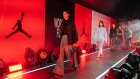 Models walk on stage during a Nike Jordan fashion show.