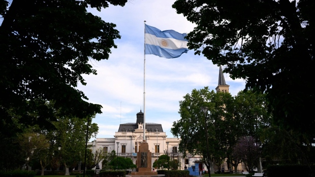 Argentina offered investors new bonds at a sharp discount in the restructurings after defaulting on $95 billion in sovereign debt in 2001. Photographer: Luis Robayo/AFP/Getty Images