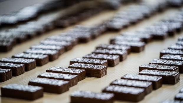 Rows of chocolate-covered wafers.