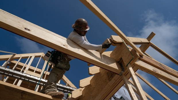 Workers build homes in Lillington, North Carolina, US. Photographer: Allison Joyce/Bloomberg