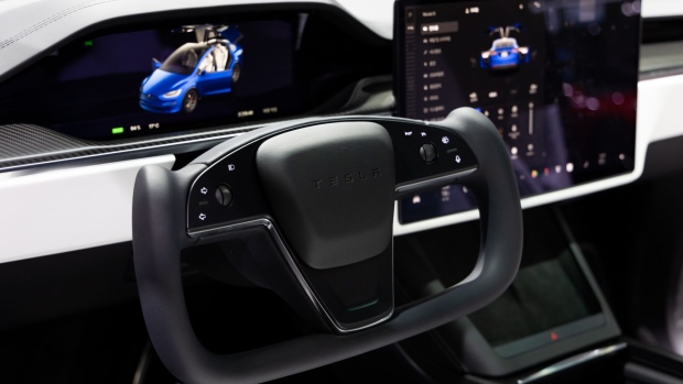 A steering wheel of the Tesla Inc. Model X electric vehicle (EV) during the Seoul Mobility Show in Goyang, South Korea, on Thursday, March 30, 2023. The motor show will continue through April 9. Photographer: SeongJoon Cho/Bloomberg