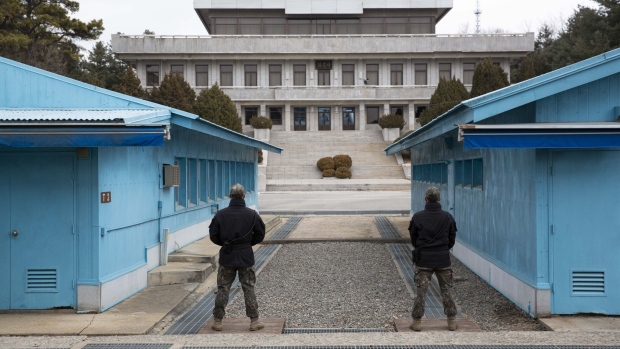 <p>South Korean soldiers stand guard in the truce village of Panmunjom inside the demilitarized zone separating South and North Korea.</p>