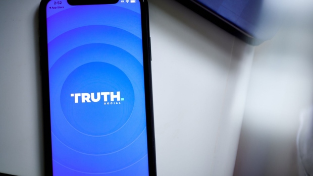 The Truth Social app on a smartphone arranged in New York, US, on Friday, March 22, 2024. Shareholders of Digital World Acquisition Corp., a publicly traded shell company, approved a deal to merge with the Trump's media business in a Friday vote. That means Trump Media & Technology Group, whose flagship product is social networking site Truth Social, will soon begin trading on the Nasdaq stock market, reported the AP.