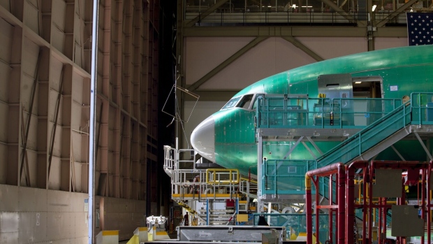 A nearly completed Boeing 777 at the company's facility in Everett, Washington. Photographer: Mike Kane/Bloomberg