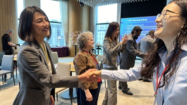 Michelle Meng-Hsiung Kiang, left, co-founder of Impact Science Ventures, engaged in an introduction game at the U.S. National Science Foundation’s first technology startup workshop overseas in Taipei.