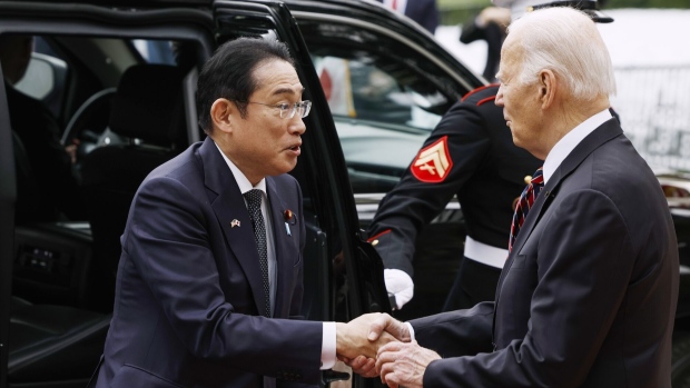Joe Biden greets Fumio Kishida at the White House on April 9.