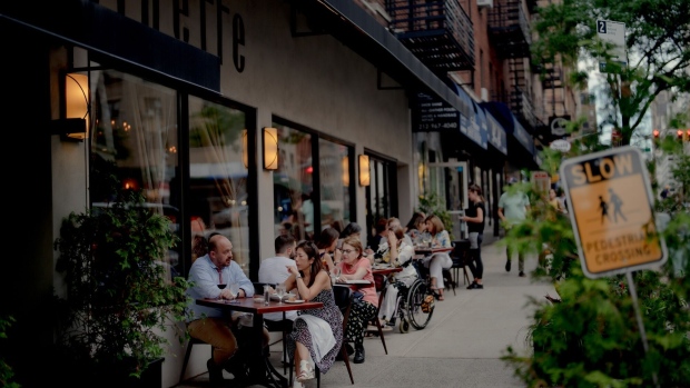 People dine at a restaurant in New York City. Photographer: Amir Hamja/Bloomberg