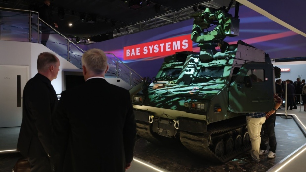 A BAE Systems all-terrain tracked vehicle is displayed at an exhibition in London in September.  Photographer: Hollie Adams/Bloomberg