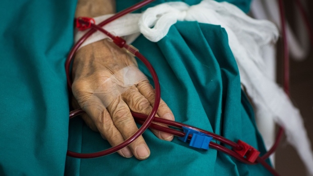 Blood runs through tubes connecting a Covid-19 patient to a hemodialysis machine in the hemodialysis care unit of Moscow City Clinical Hospital 52 in Moscow, Russia, on Wednesday, May 13, 2020. Russia has the world’s second-highest number of coronavirus infections at 290,678 so far.
