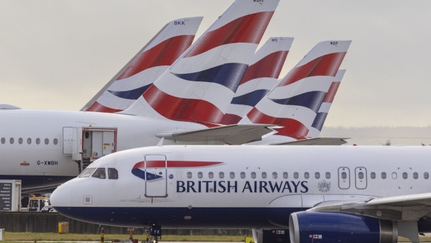 <p>Passenger aircraft, operated by British Airways Plc, at Heathrow Airport. IAG SA, the airline’s parent company, has pledged to up its sustainable aviation fuel usage to 10% by 2030.</p>