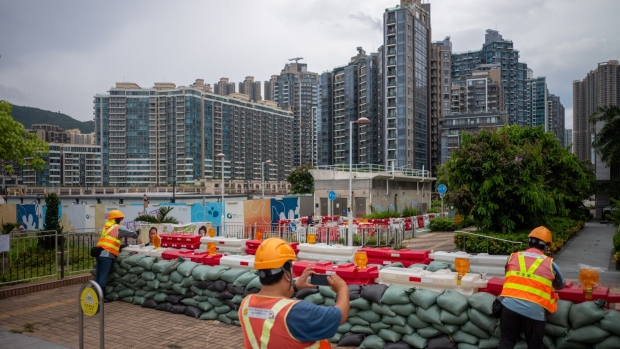 Sandbags placed near the waterfront in a residential area during a No. 8 storm signal raised for Super Typhoon Saola in Hong Kong, China, on Friday, Sept. 1, 2023. Hong Kong is bracing for what may be the strongest storm to hit the city in at least five years as Super Typhoon Saola heads straight toward the financial hub. Photographer: Justin Chin/Bloomberg