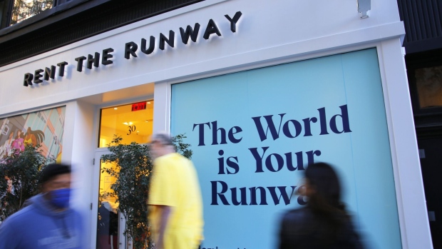 <p>People walk past the Rent the Runway store in New York City. </p>