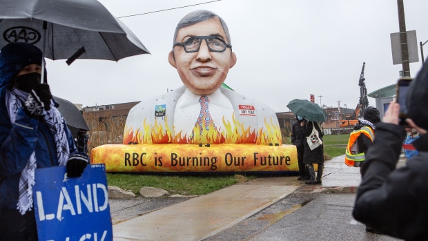 A protest during the RBC AGM in Toronto on April 11. Photographer: Della Rollins/Bloomberg