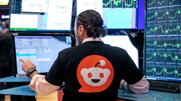 <p>A trader works during the Reddit Inc. initial public offering on the floor of the New York Stock Exchange.</p>
