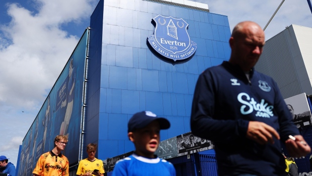 <p>Fans arrive outside the stadium prior to an Everton FC match in Liverpool. </p>