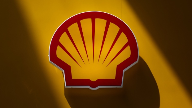A logo at the Shell Plc booth on day two of the Abu Dhabi International Petroleum Exhibition and Conference (ADIPEC) in Abu Dhabi, United Arab Emirates, on Tuesday, Oct. 3, 2023. The annual strategic energy conference runs from Oct 2-5. Photographer: Christopher Pike/Bloomberg