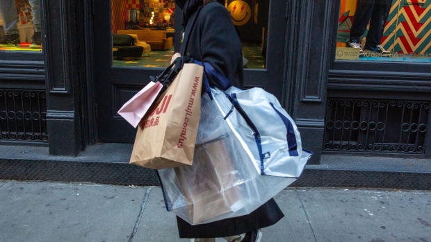 A shopper in the Soho neighborhood of New York. Photographer: Shelby Knowles/Bloomberg
