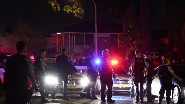 Police gather outside the Christ the Good Shepherd Church in Sydney’s western suburb of Wakeley on April 15. Photographer: David Gray/AFP/Getty Images