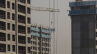 Residential buildings under construction at China Vanke Co.'s Isle Maison development in Hefei, China, on Monday, Nov. 27, 2023. China is ramping up pressure on banks to support struggling real estate developers, signaling President Xi Jinping’s tolerance for property sector pain is nearing its limit. Source:  /Bloomberg