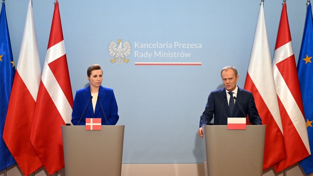 Mette Frederiksen, left, and Donald Tusk during a joint press conference in Warsaw, Poland on April 15. Photographer: Sergei Gapon/AFP/Getty Images
