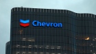 The Chevron Corp. logo atop One The Esplanade office tower, which houses the company's office, in Perth, Australia, on Thursday, Sept. 14, 2023. Liquefied natural gas workers at key Chevron sites in Western Australia have begun ramping up a campaign of industrial action in a dispute that has roiled global energy markets. Photographer: Philip Gostelow/Bloomberg