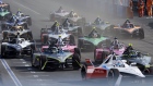 Formula E Gen3 race cars at the start of the Formula E Tokyo E-Prix in Tokyo on March 30.