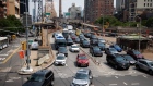 Traffic exits the Ed Koch Queensboro Bridge in New York City. 