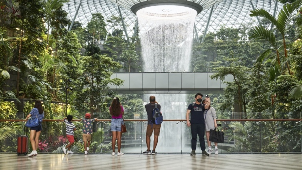 <p>Visitors at Jewel Changi Airport mall in Singapore.</p>